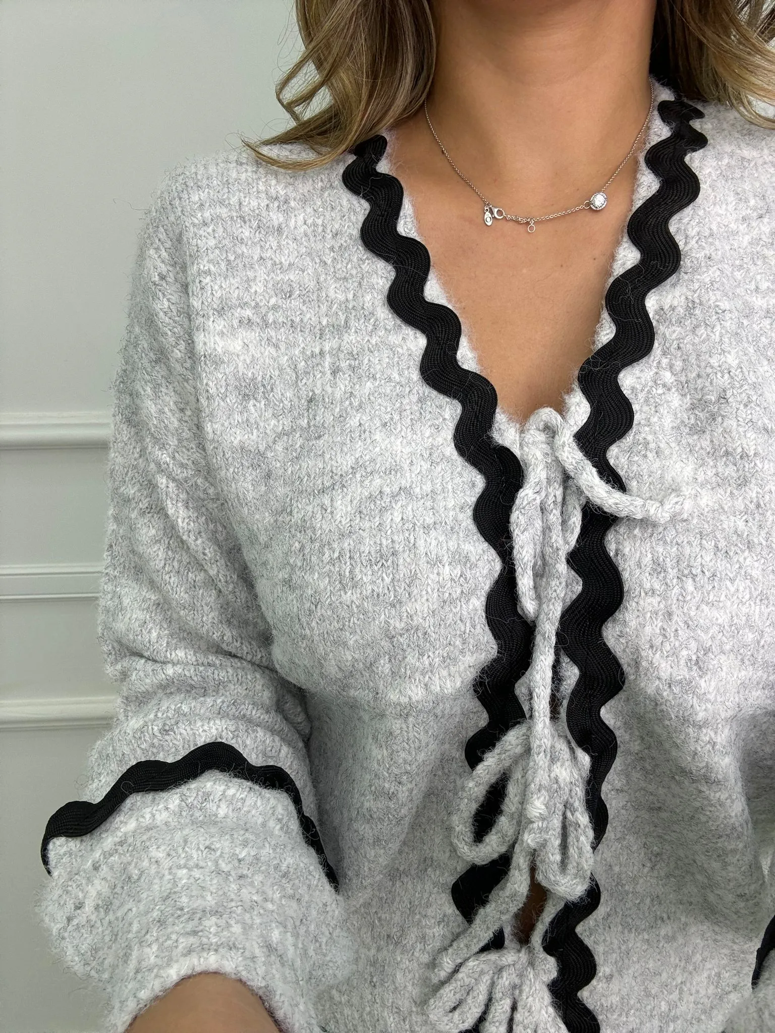 Cardigan con laccetti regolabili